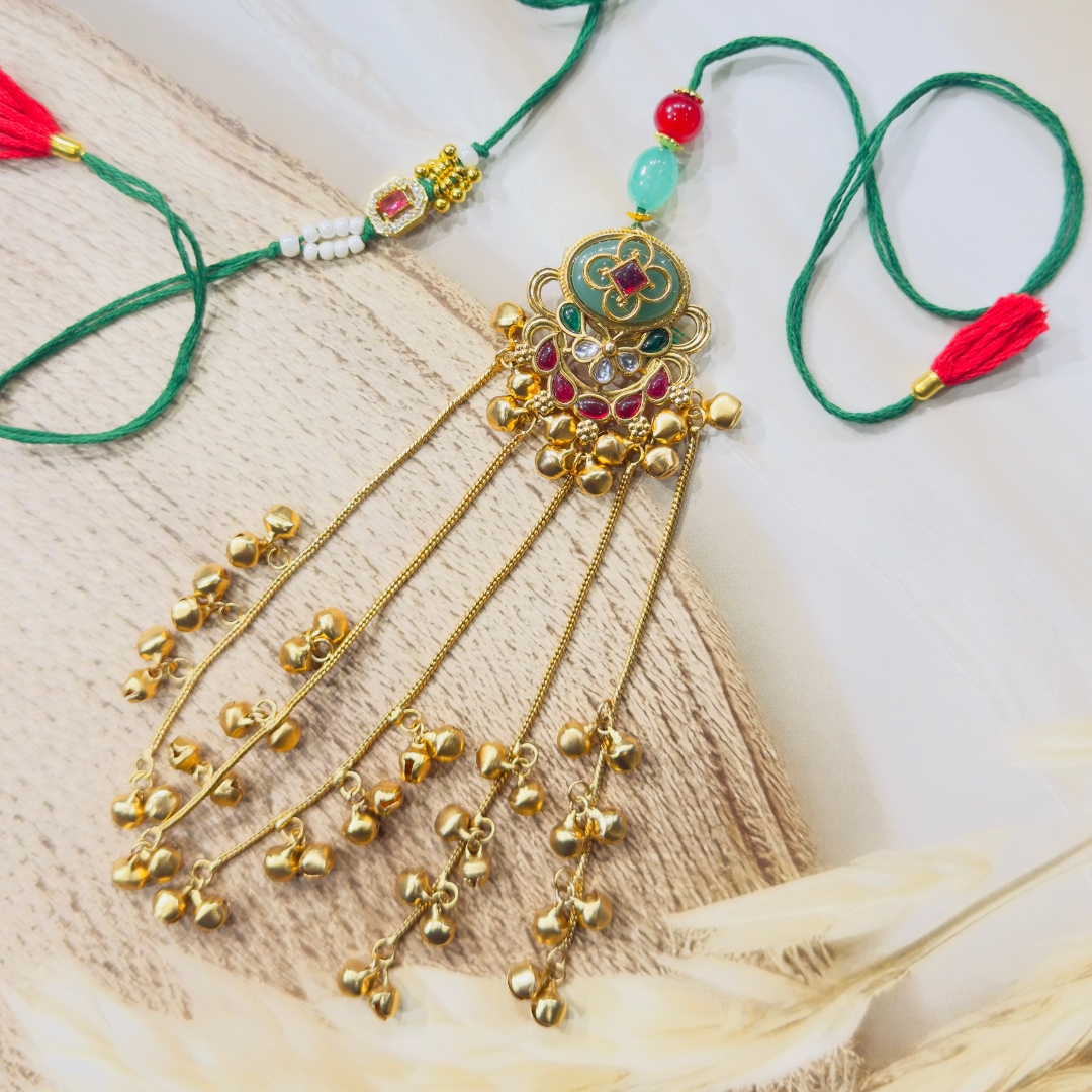 102 Regal Ghungroo Bhaiya Bhabhi Rakhi Set - Image 1