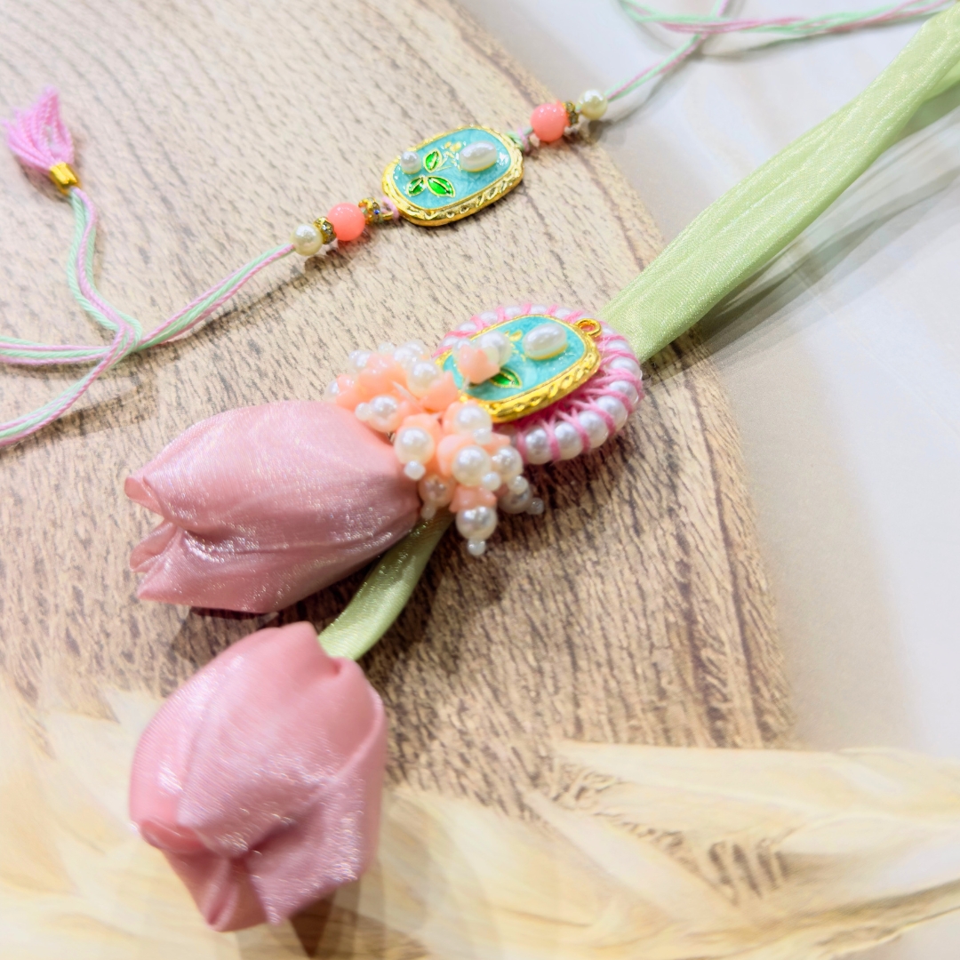 108 Blossom Pearl Bhaiya Bhabhi Rakhi Set - Image 1