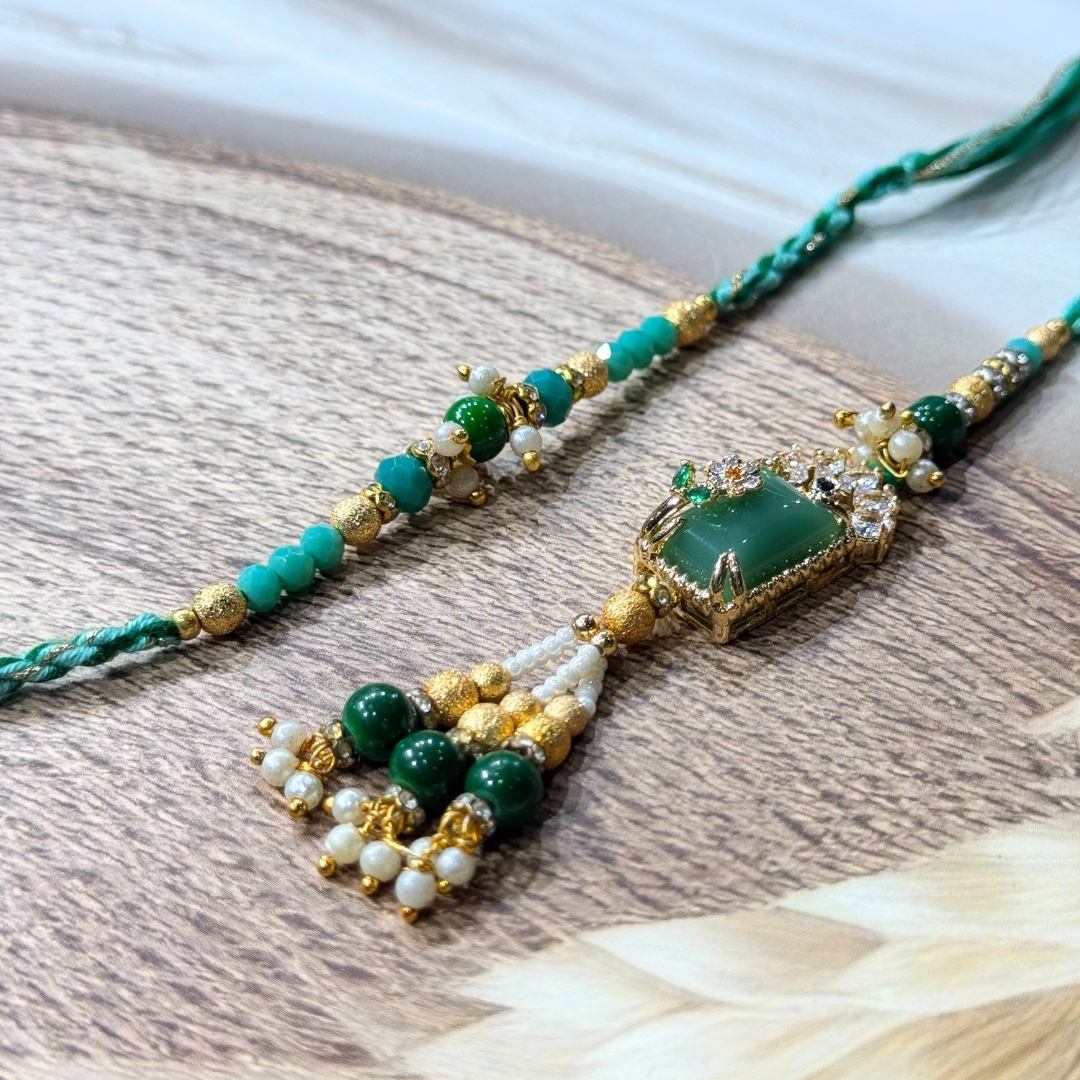 110 Emerald Grace Bhaiya Bhabhi Rakhi Set - Image 1