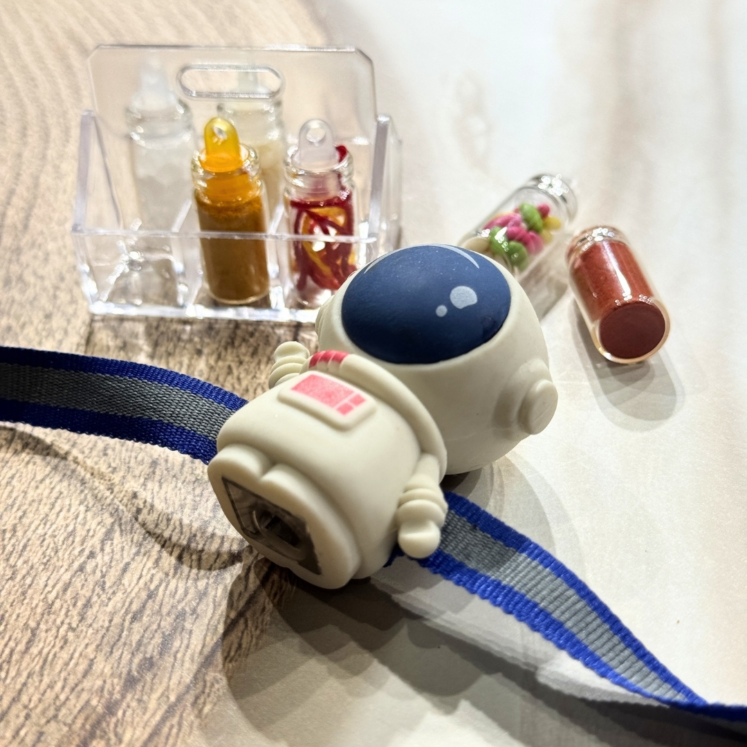 12 Astronaut Sharpener Rakhi - Image 1